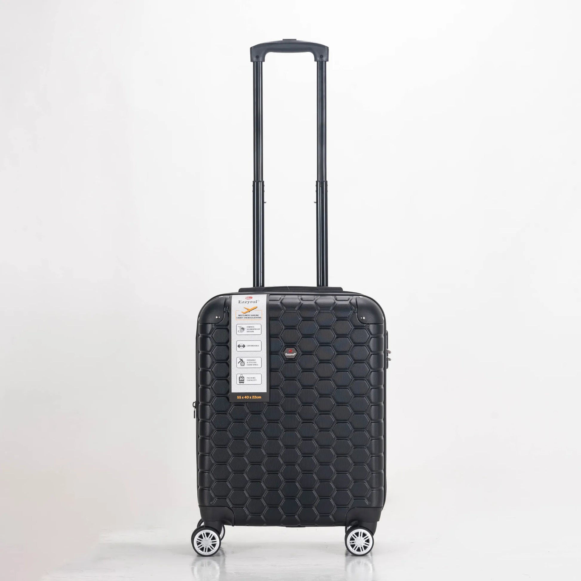 Black suitcase with honeycomb pattern on a white background