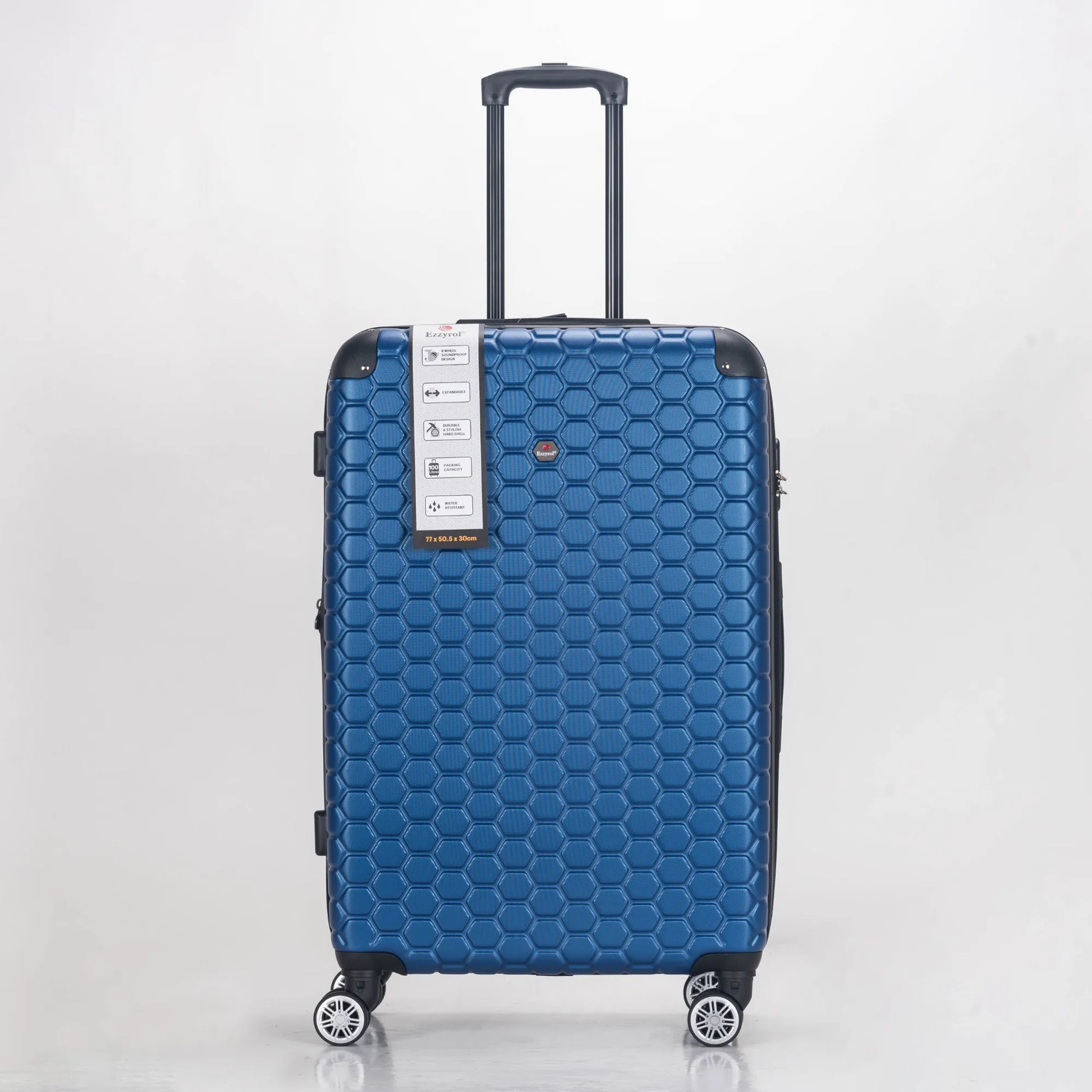 Blue suitcase with honeycomb pattern on a white background