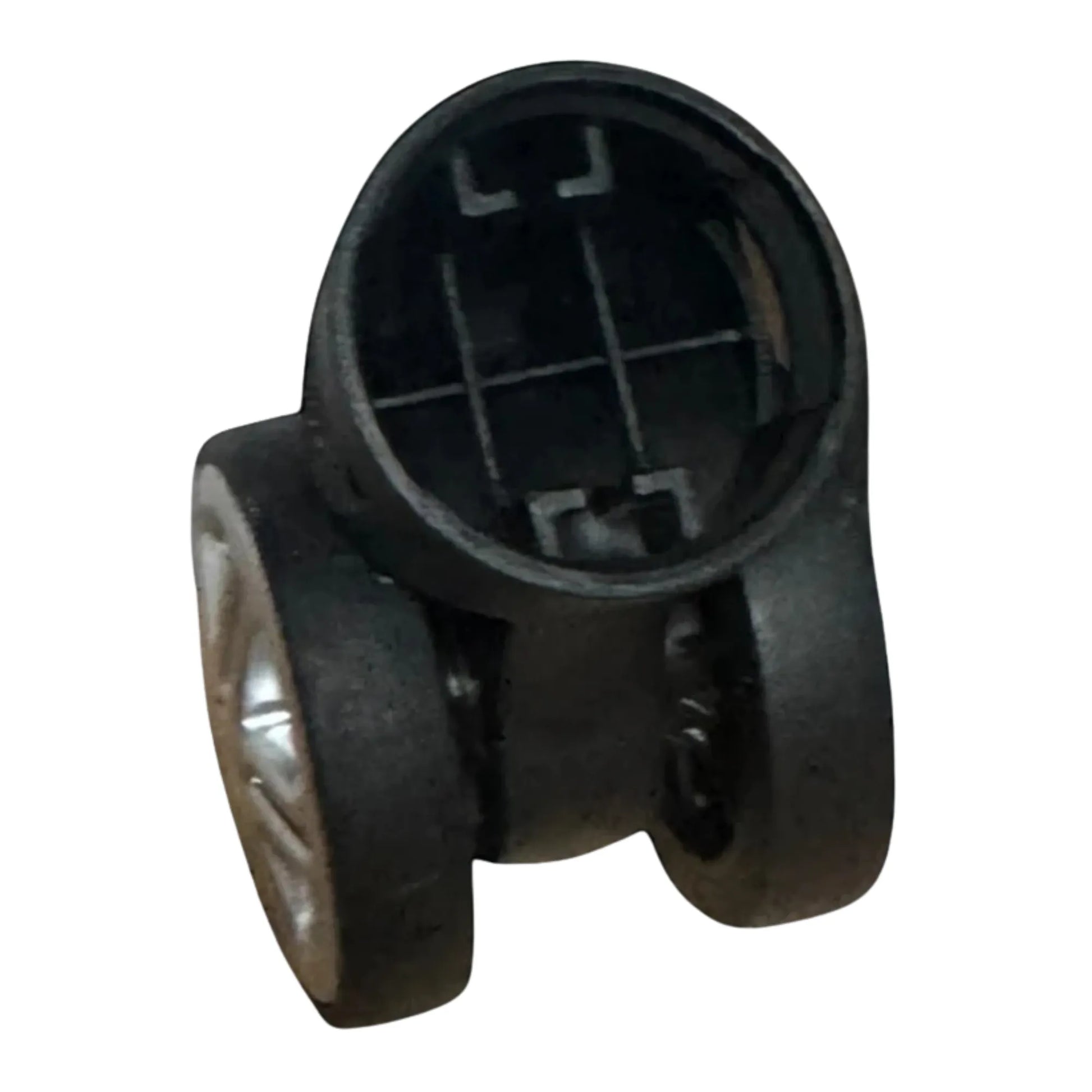 Black plastic component on a white background