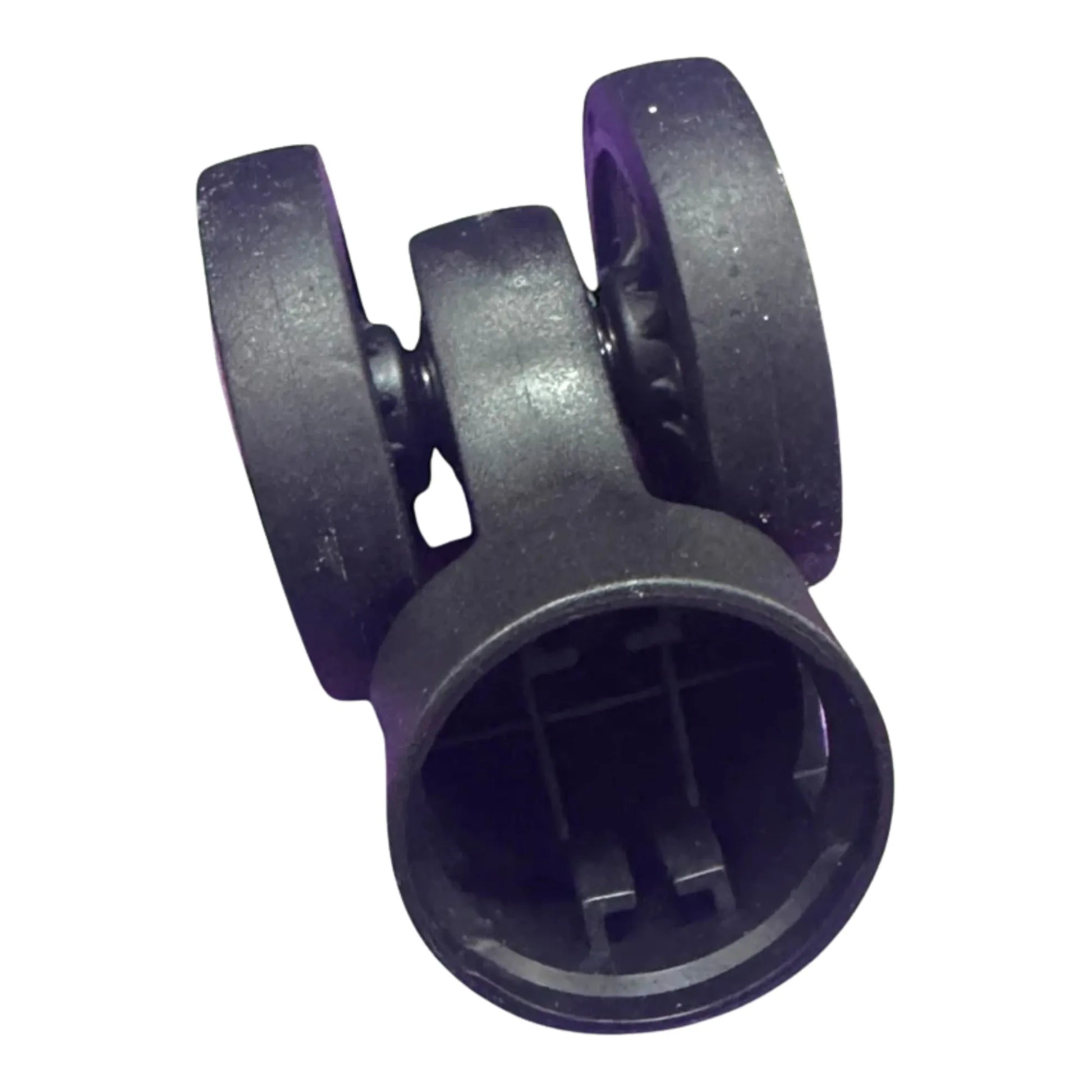 Black plastic component with wheels on a white background