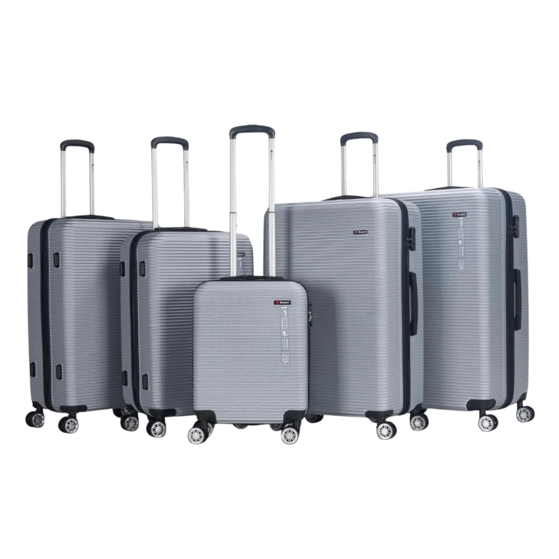 Set of five gray suitcases of different sizes on a white background