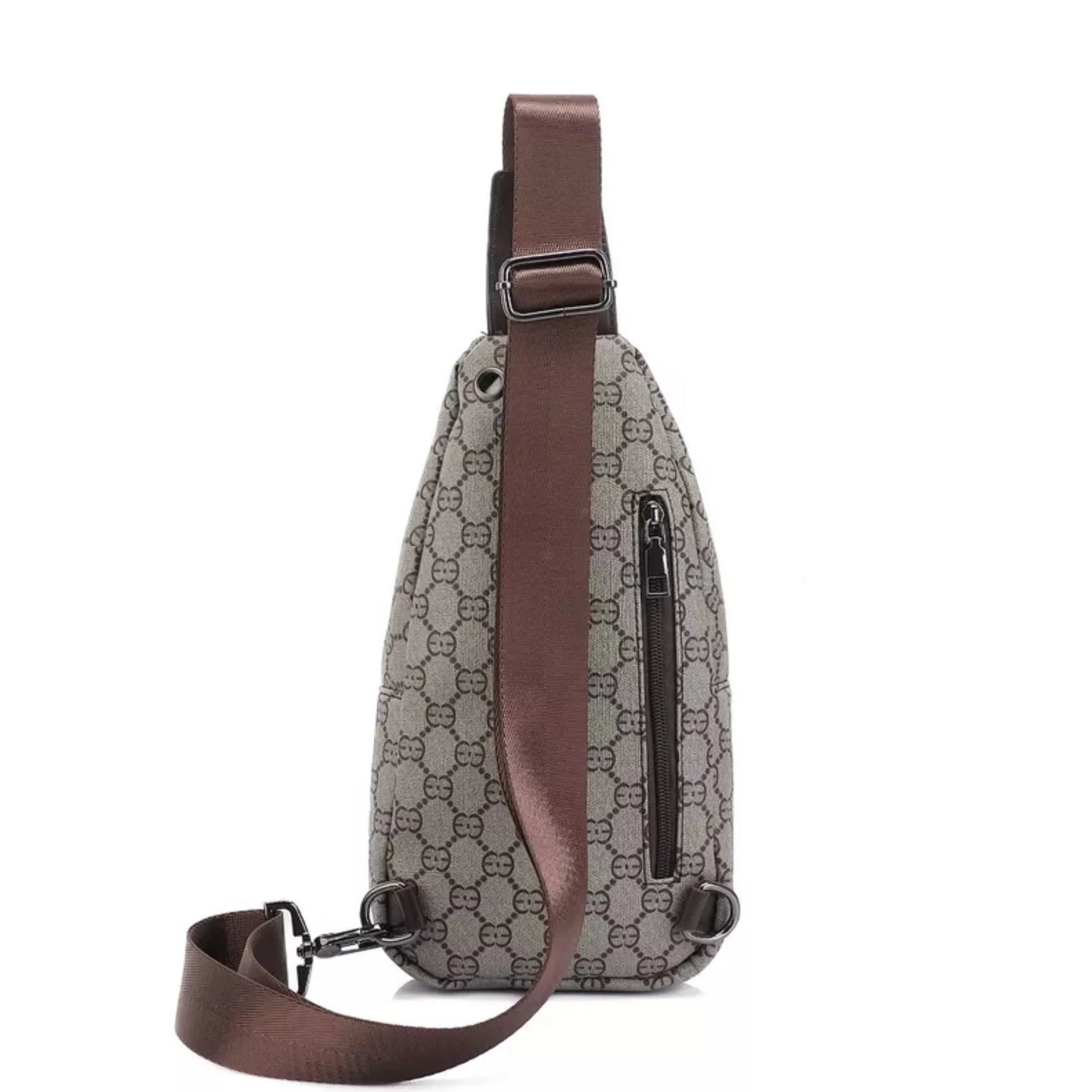 Sling bag with brown strap and patterned body on a white background