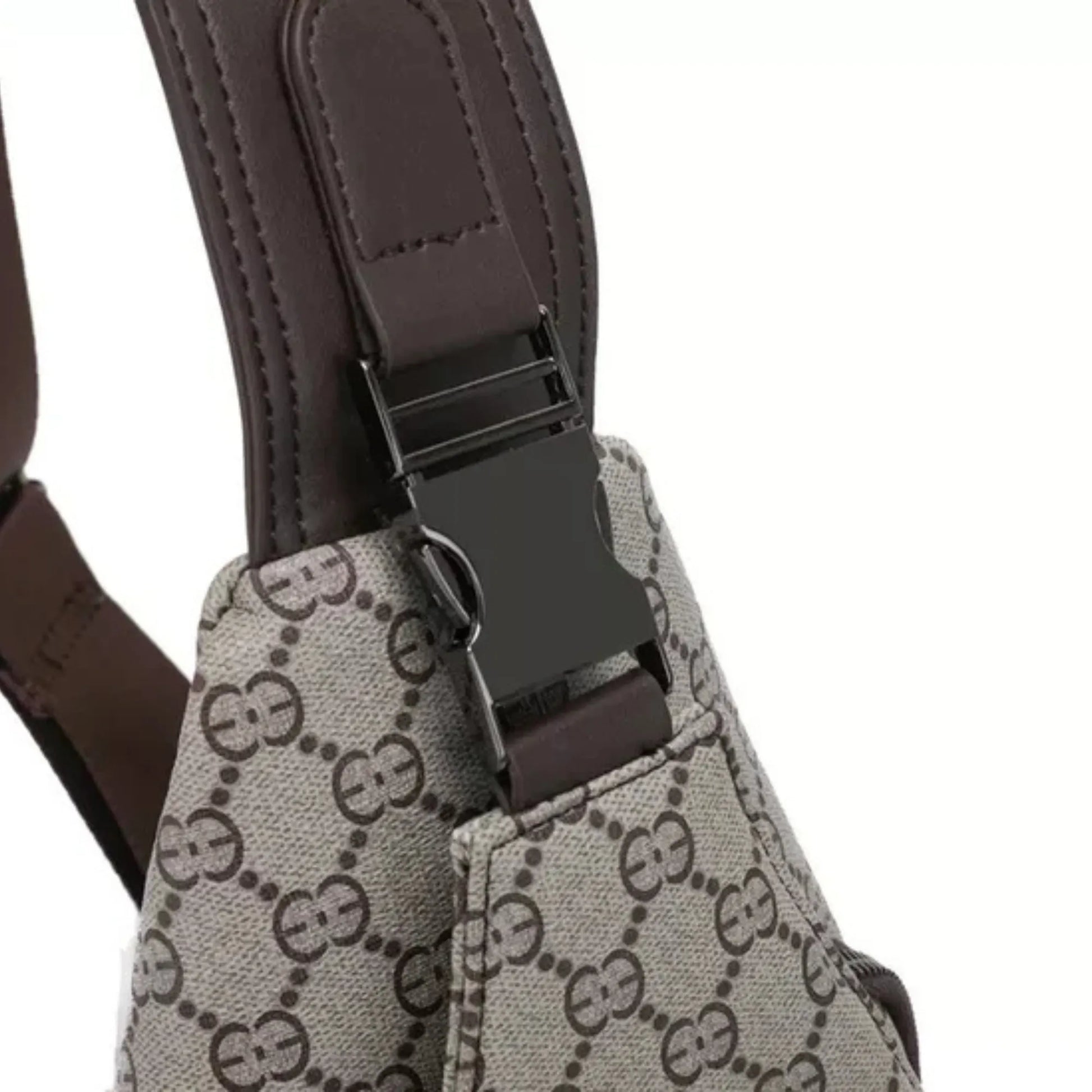 Close-up of a patterned bag with a brown strap on a white background