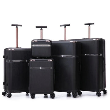 Set of black suitcases with wheels on a white background