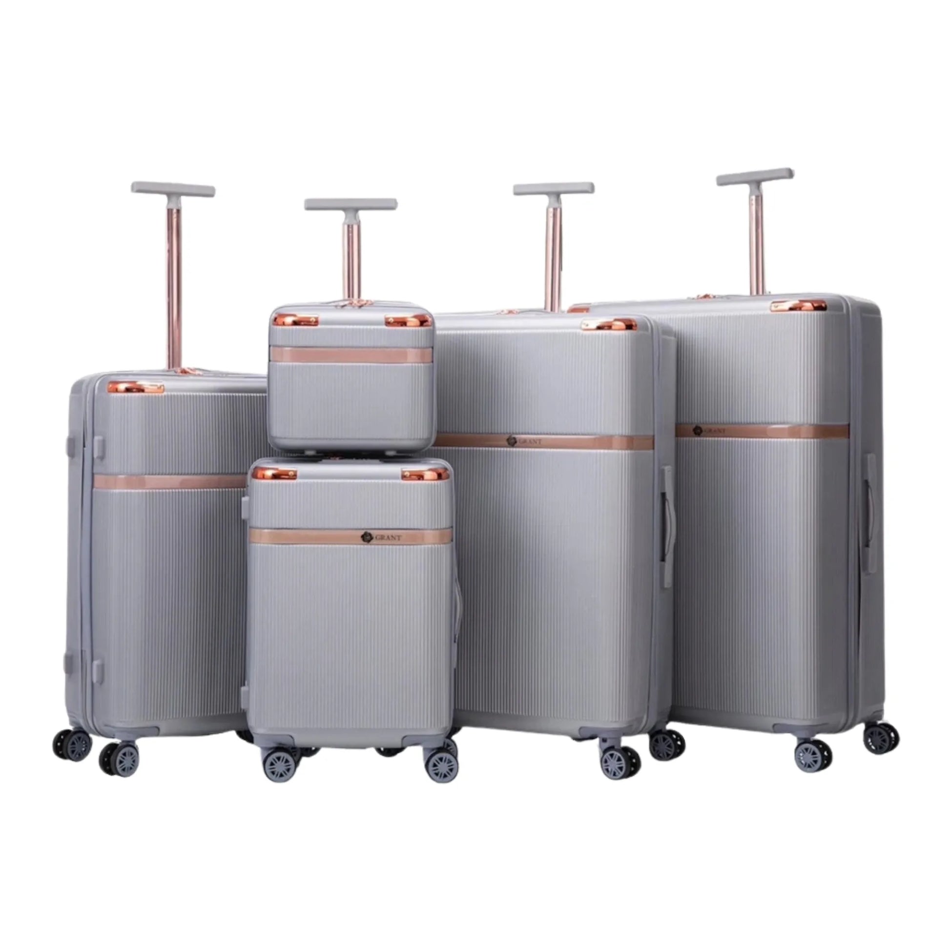 Set of gray suitcases with rose gold accents on a white background