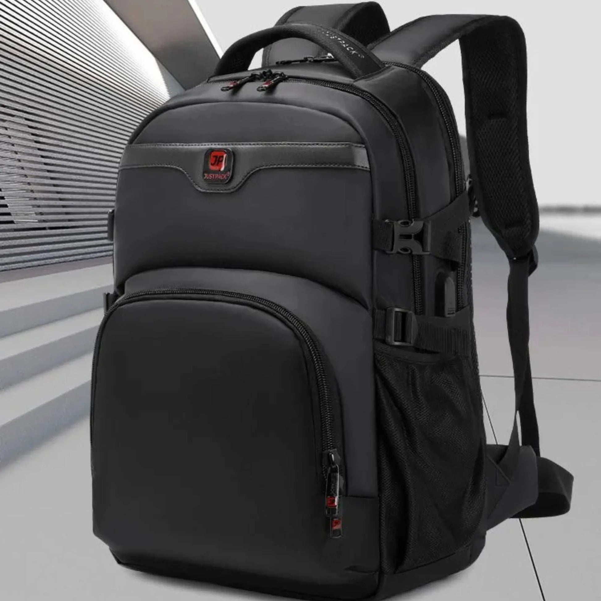 Black backpack with brand logo on a light gray background