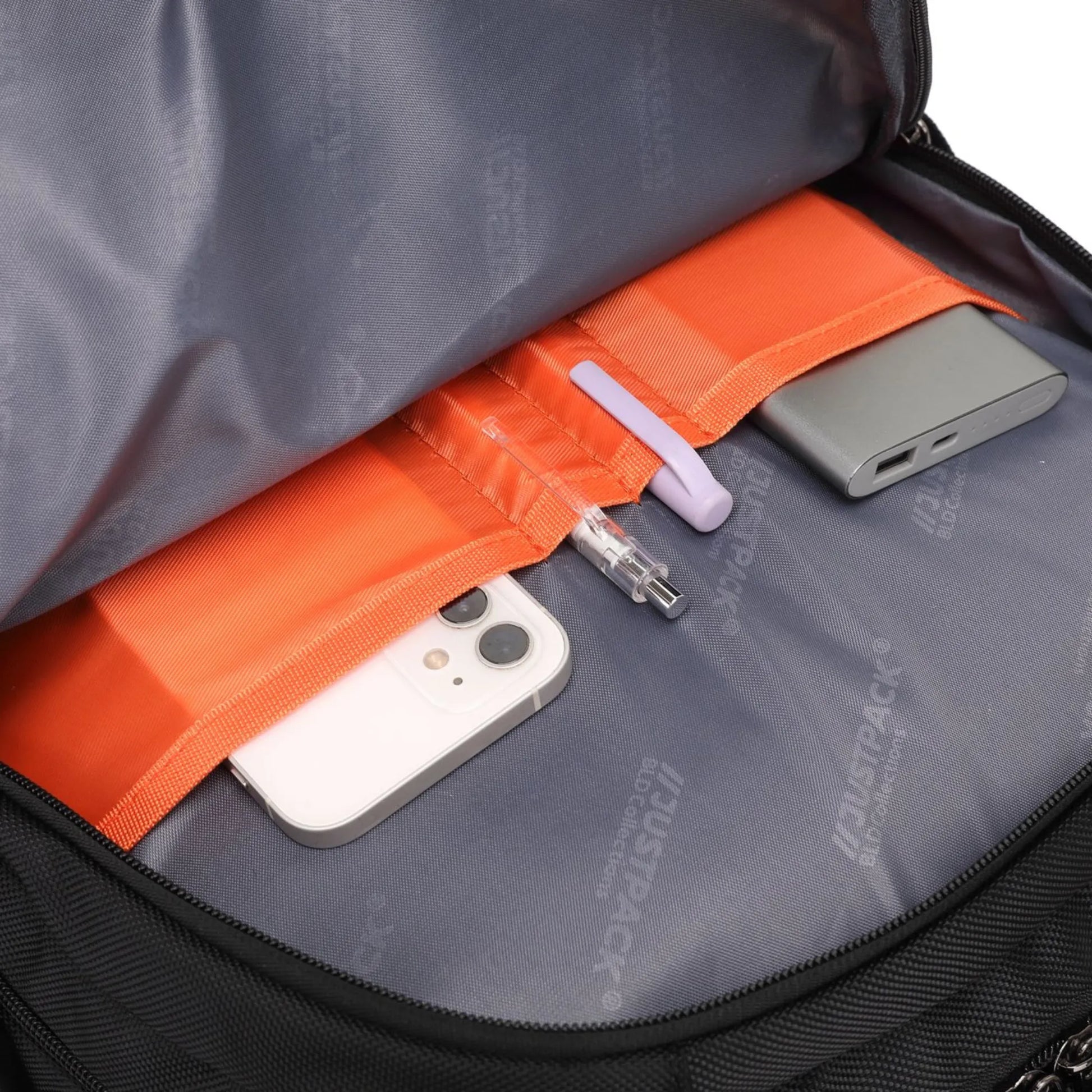 Gray backpack with orange interior showing electronic devices